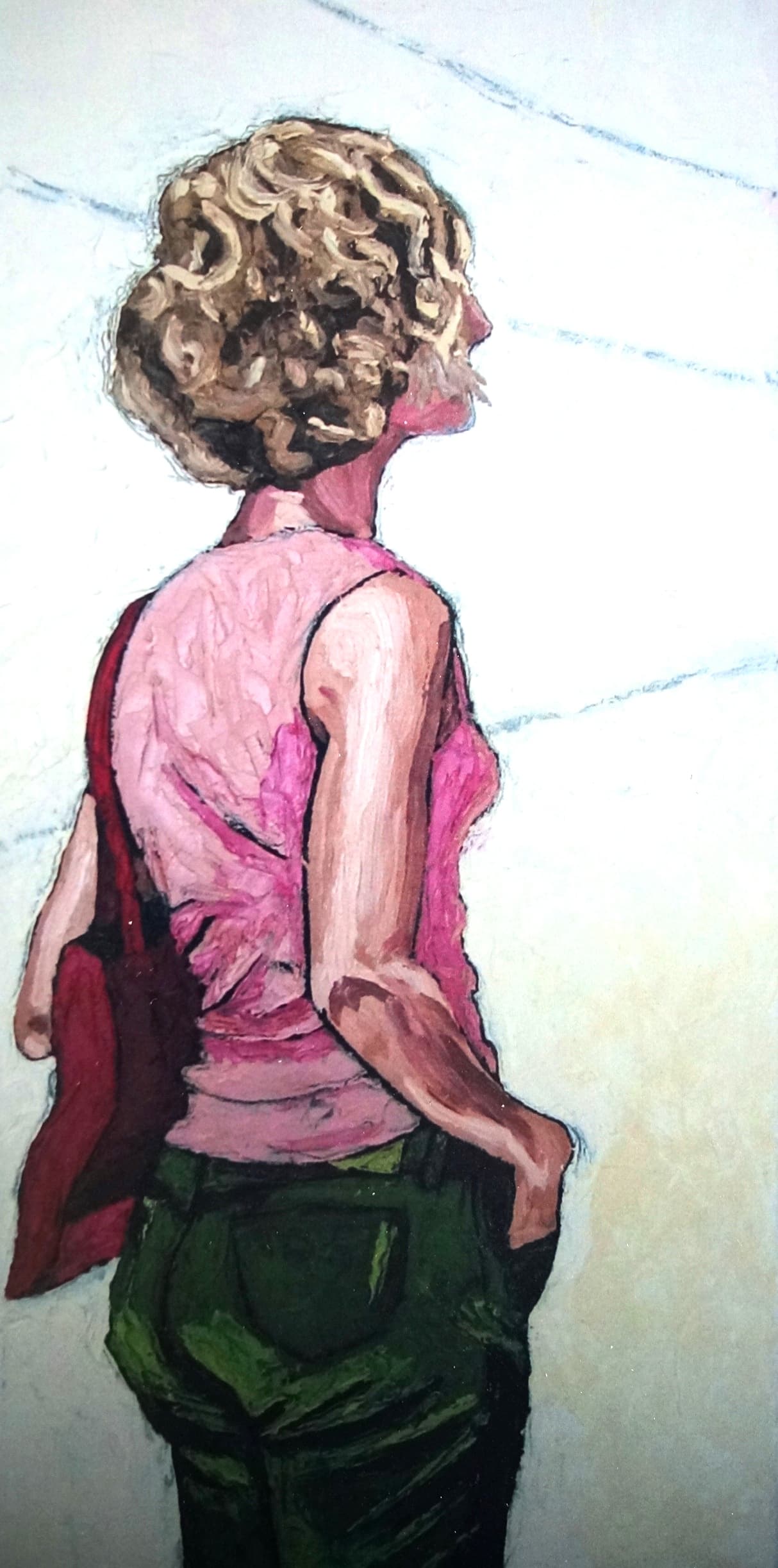 First woman standing facing right